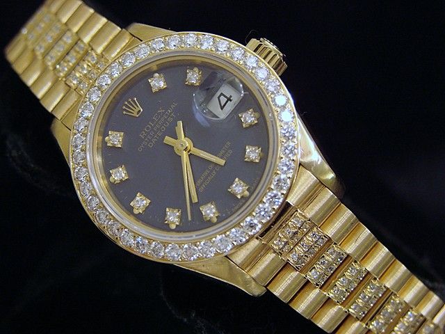  50 ct diamonds on band dial bezel this is one of the most amazing