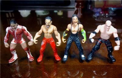 SET OF 10pc MINI WWE WRESTLING FIGURES Randomly  