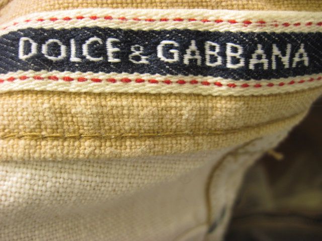 you are bidding on a pair of dolce gabbana light beige jeans size 45 