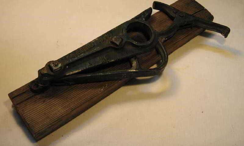 Antique Cast Iron Ladder Latch Mounted Wood Circa 1913  